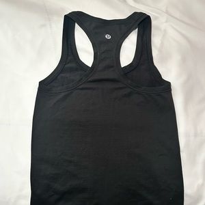 Black swiftly tech/ race length/ size: 0